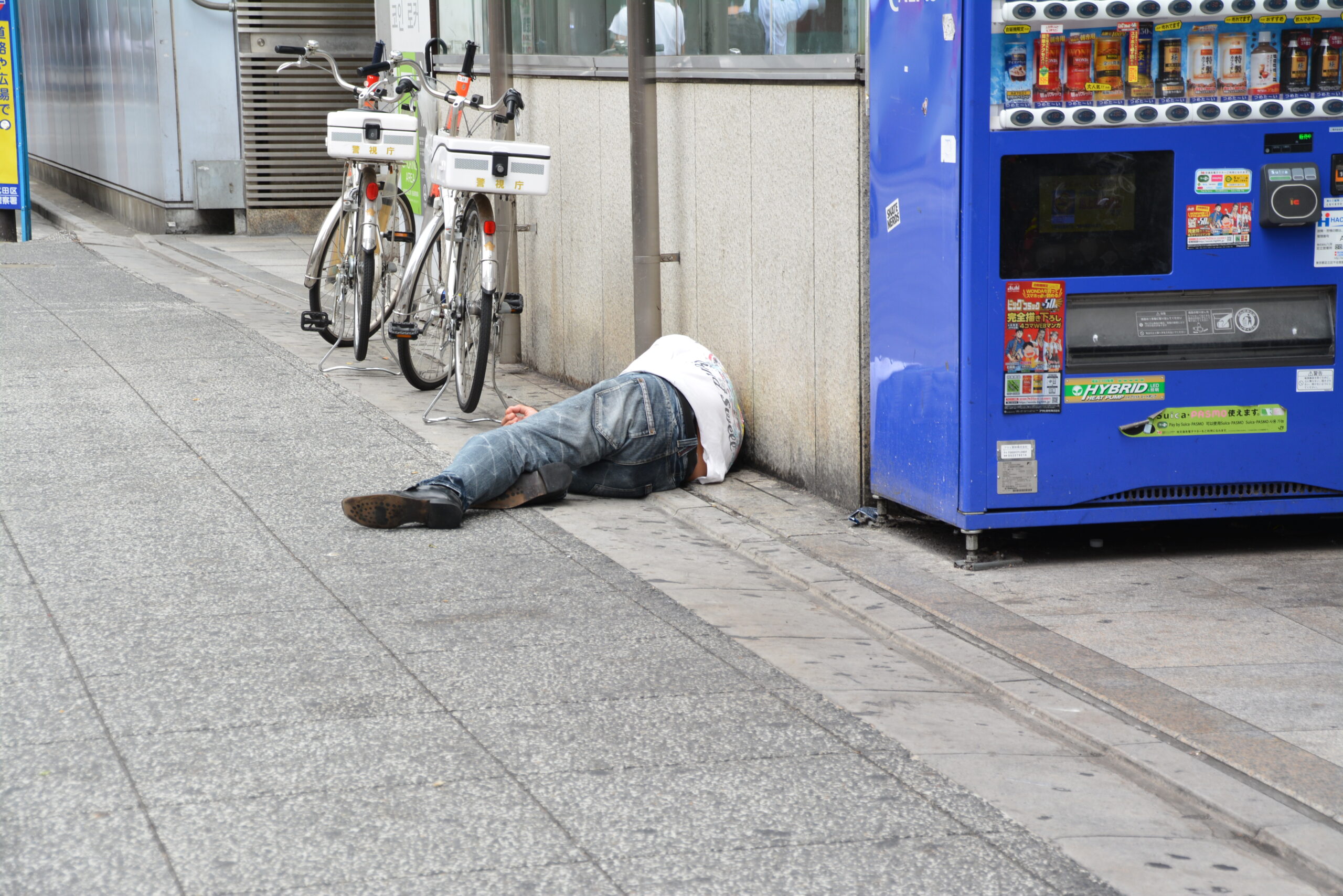 lying drunker in street